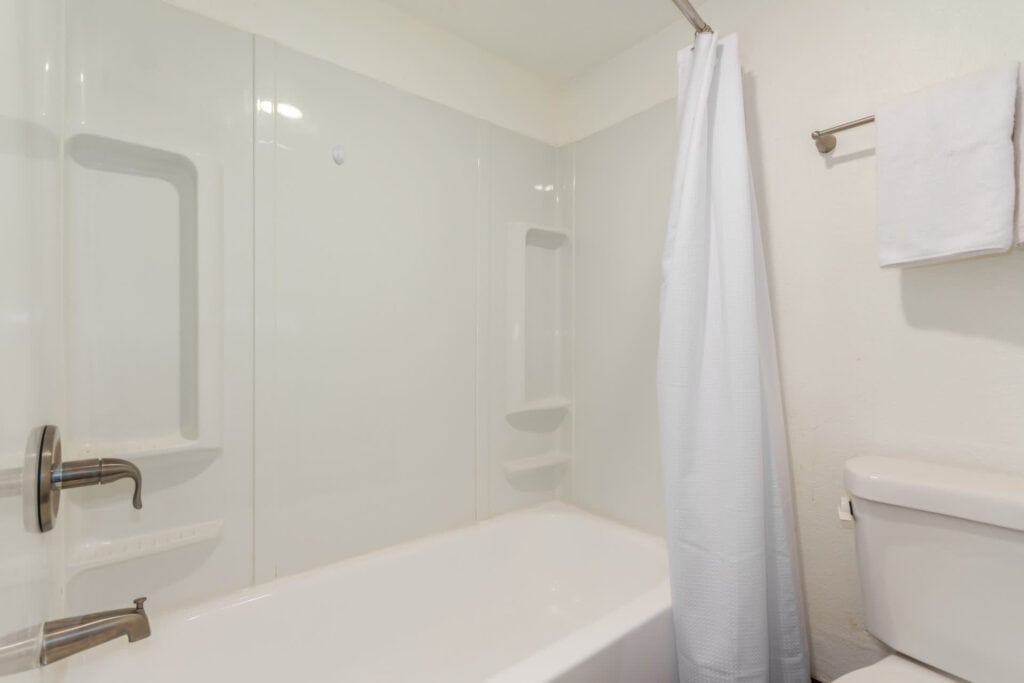 Full size bath with shelves built in